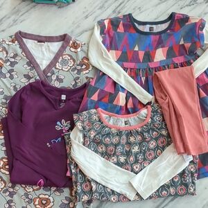 Tea Collection lot of four long-sleeved 5T dresses, one pair of leggings